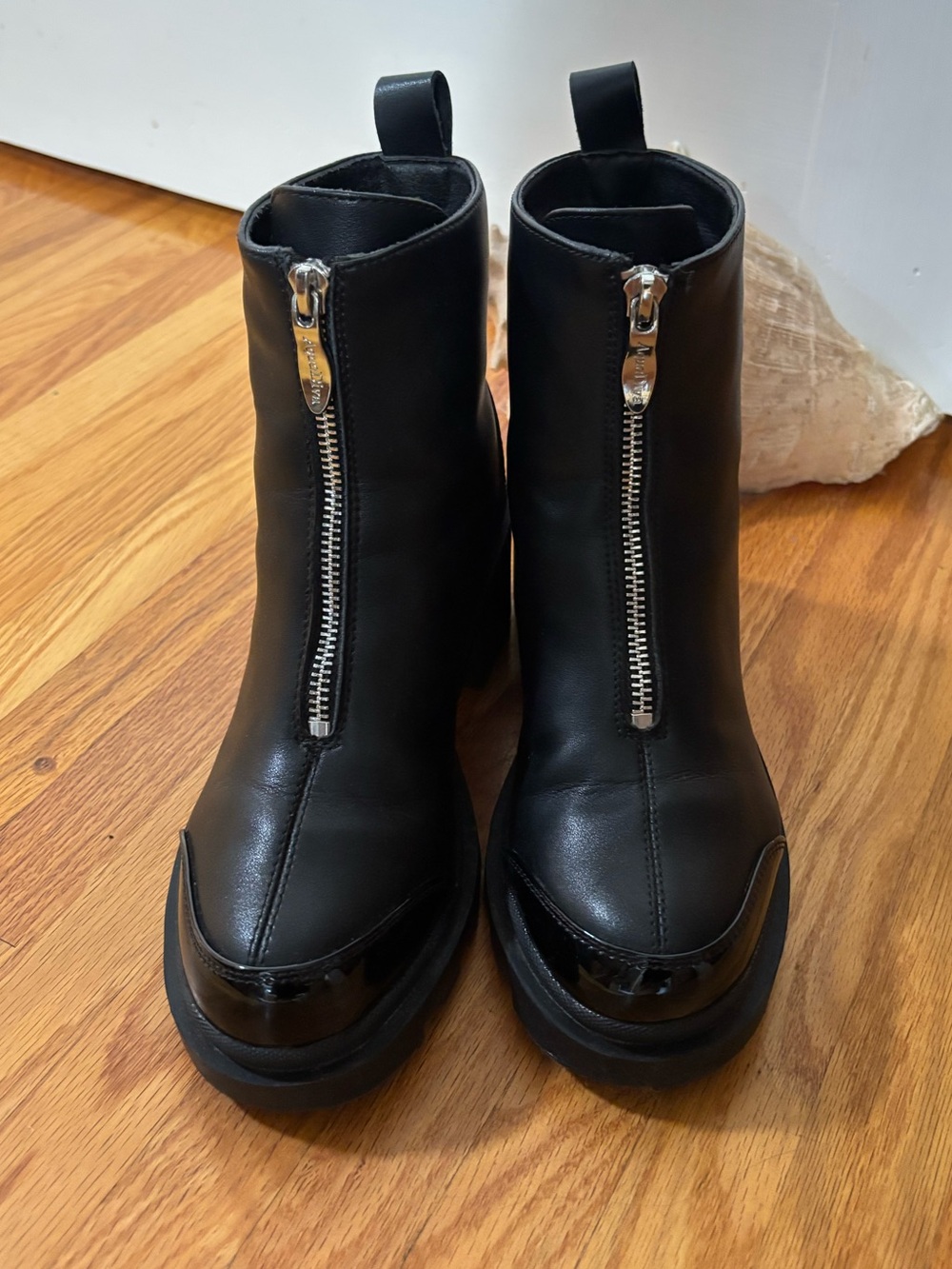 Adiva Black Front-Zip Leather Ankle Booties